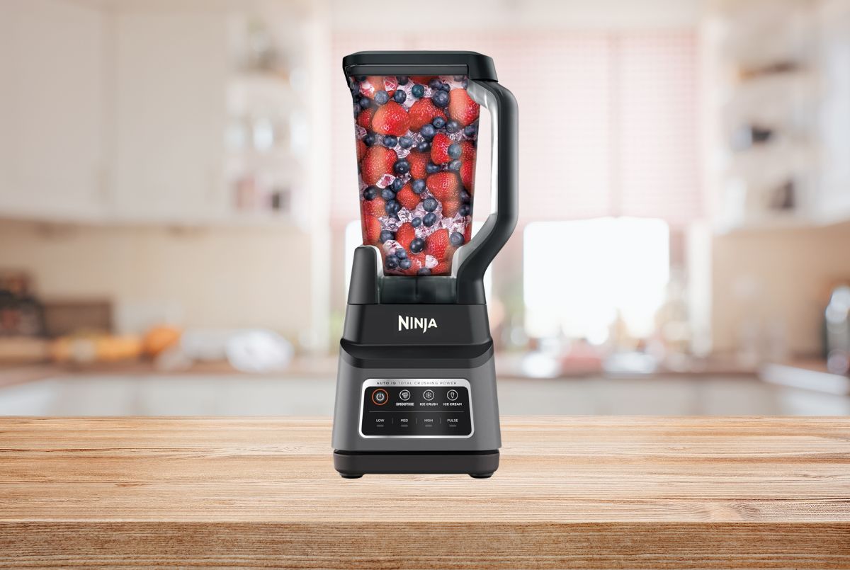 Ninja BN701 Professional Plus 1400W blender with 72oz pitcher and personal cups on kitchen counter