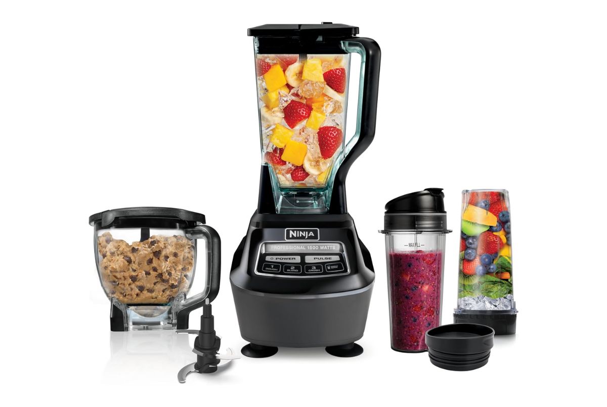 Ninja BL770 Kitchen System 1500W with 72oz pitcher, 64oz food processor bowl, and 2 personal cups on kitchen counter