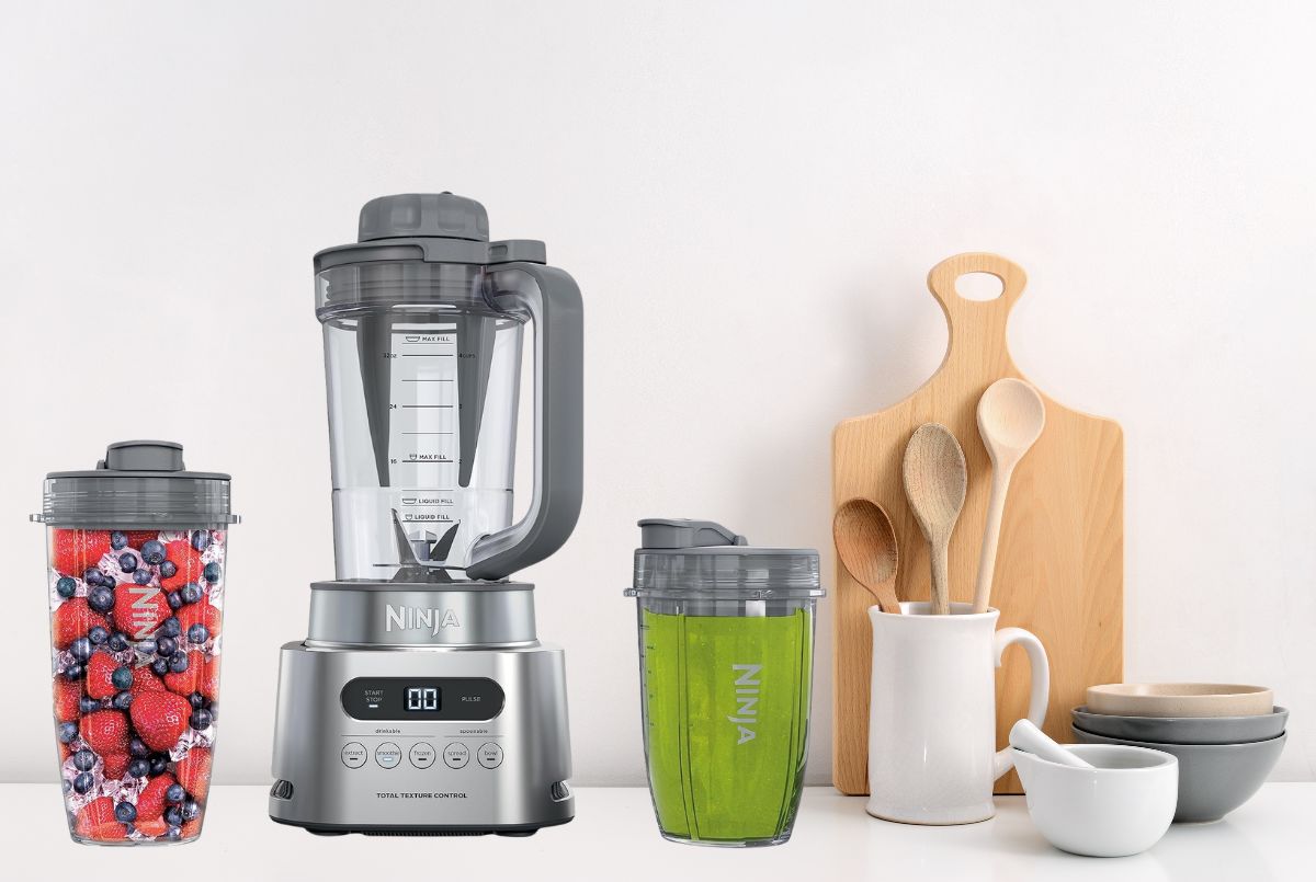 Ninja SS151 TWISTi 1600W blender with TWISTi cup system on white countertop