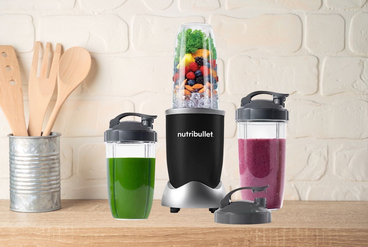 NutriBullet Pro 900W compact personal blender with 32oz cup and To-Go lid on kitchen counter