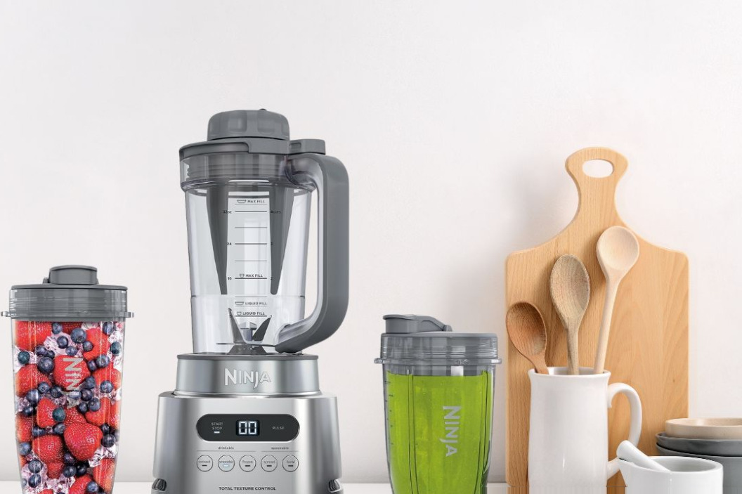 Ninja SS151 TWISTi 1600W blender with TWISTi cup system on white countertop