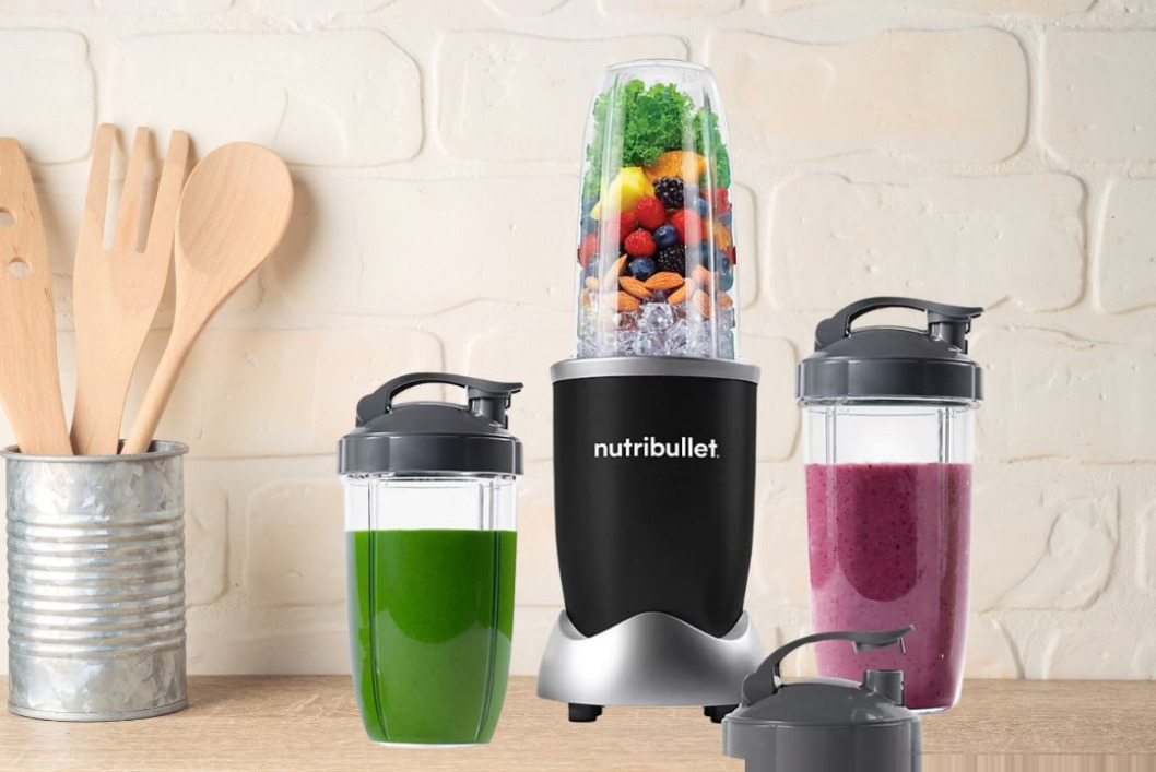 NutriBullet Pro 900W compact personal blender with 32oz cup and To-Go lid on kitchen counter